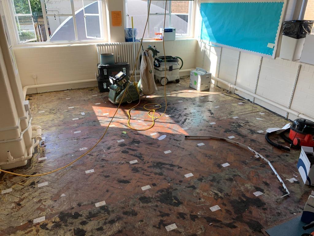 Pine parquet hall — lifting blocks re-laid, sanding in progress, by Fix Flooring London
