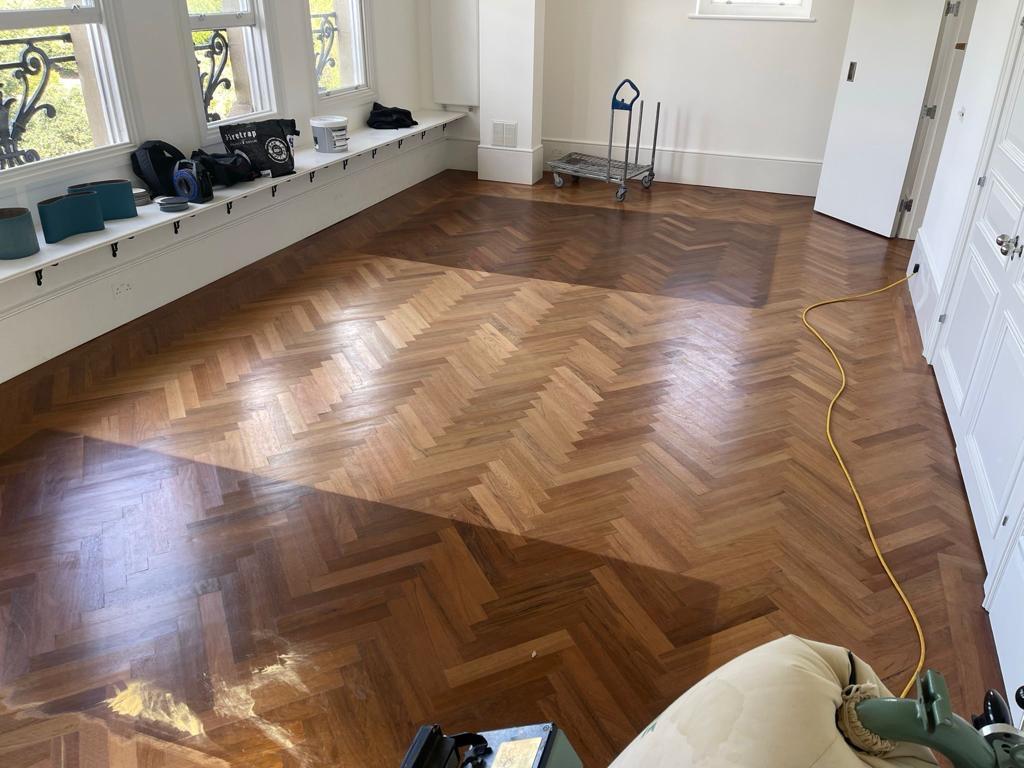Walnut herringbone — sanding and finishing in progress, by Fix Flooring London