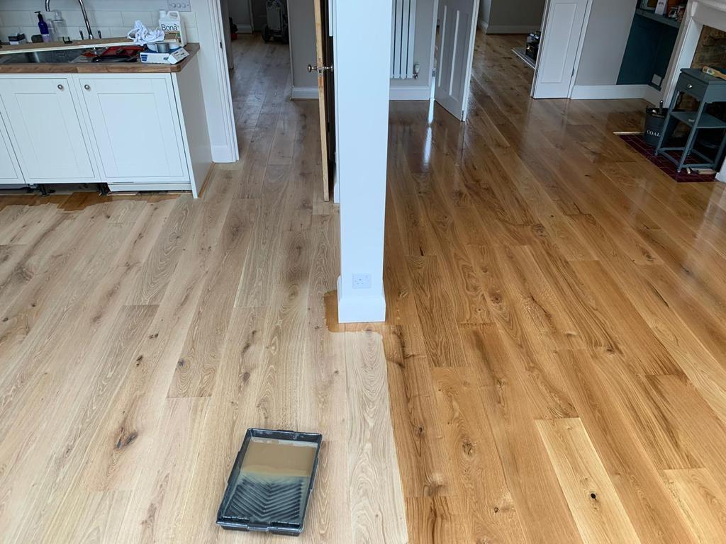 Engineered oak boards — oiling in progress, half finished, by Fix Flooring London